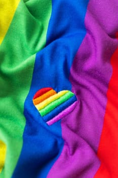 Rainbow fabric with a heart in the form of an LGBT flag. LGBT concept, same sex relationship and homosexual concept. Support, tolerance