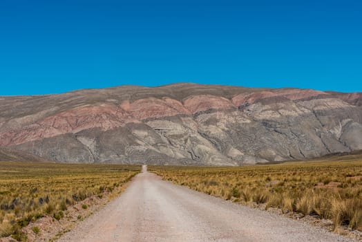 straight dirt road in the peruvian Andes at Arequipa Peru