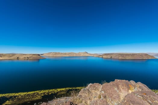 Titicaca Lake from Silustani in the peruvian Andes at Puno Peru
