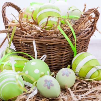colorful green painted easter eggs decoration easter custom festive wooden table
