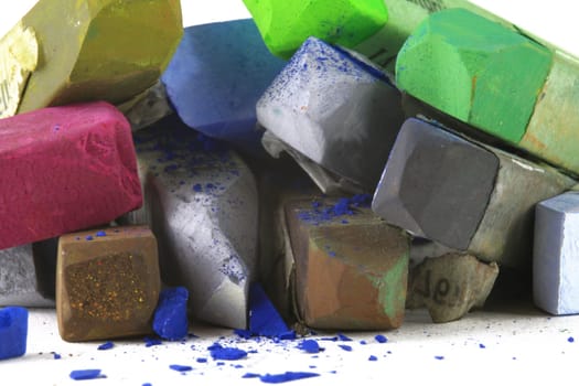 Pastel chalk pieces in different colors,used in a heap