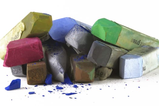 Pastel chalk pieces in different colors,used in a heap