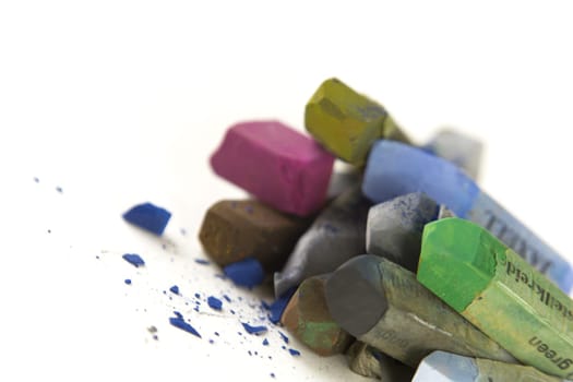 Pastel chalk pieces in different colors,used in a heap