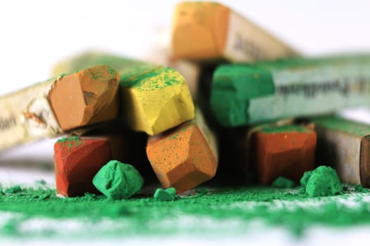 Pastel chalk pieces in different colors,used in a heap