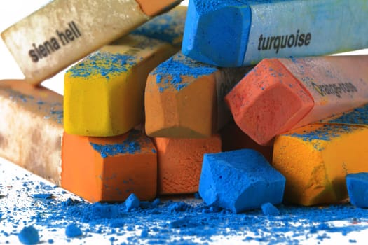 Pastel chalk pieces in different colors,used in a heap