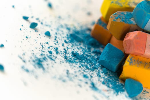 Pastel chalk pieces in different colors,used in a heap