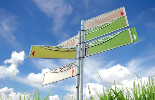 signpost and blue sky