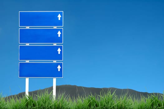 signpost and blue sky