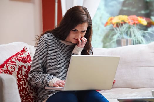 teenage girl looking worried due to internet bullying