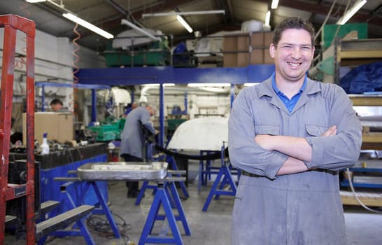 senior worker on factory floor in the manufacturing industry