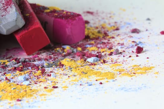 Pastel chalk pieces in different colors,used in a heap