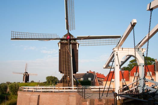 Windmill and drawbridge in Heusden  a fortified town in the Netherlands.
