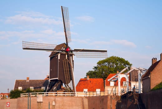 Windmill and drawbridge in Heusden  a fortified town in the Netherlands.