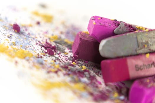 Pastel chalk pieces in different colors,used in a heap