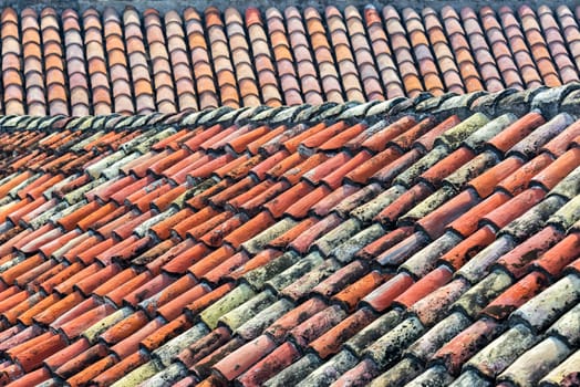 Old roof tiles forming a pattern on a colonial building in the historic center of Cartagena, Colombia