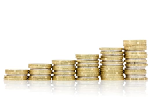 Rising silver and gold  coins stairs with reflection isolated on white background