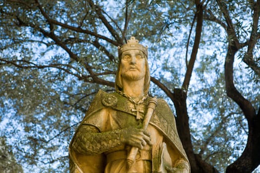 Statue of King Ferdinand The Catholic at entry of Alcazar de los Reyes Cristianos Place is declared UNESCO World Heritage Site.