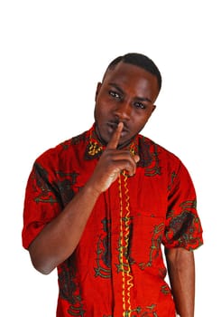 A handsome young black man in a colorful red shirt with one finger on his.mouth, for white background..