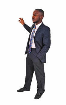 A young black business man standing in a suit and tie, holding up his.hand for white background..