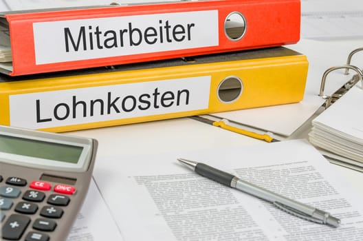 File folder labeled Employees and labor costs