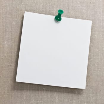 Note white paper tacked on a wall