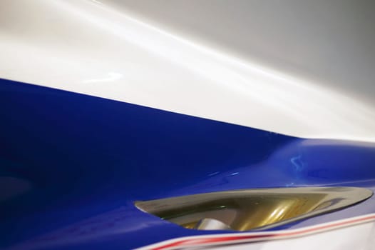The close-up of the exhaust pipe or exhaust of a racing car.