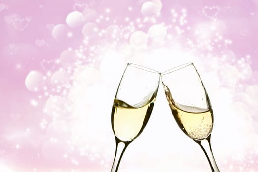 Glasses of champagne on background with blurred lights