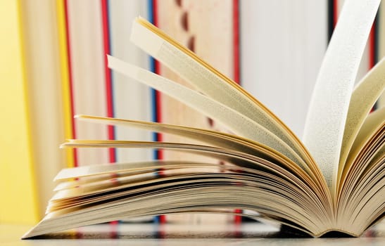 Composition with glasses and books on the table