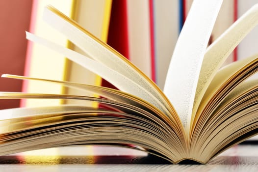 Composition with glasses and books on the table