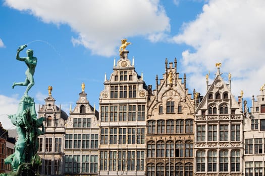 Guildhouses in Antwerp with the statue of Brabo and the giant's hand.