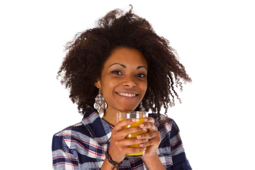 Young African-American woman with a glass of orange juice - cropped on white background