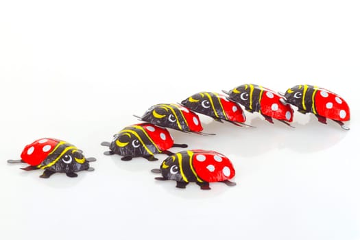 Ladybug made of chocolate on a light background