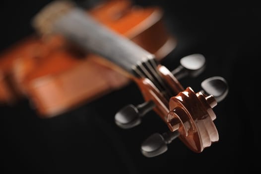 close up shot of a violin, shallow deep of field