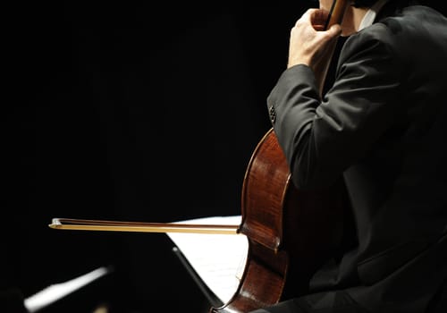 playing  chello during a classical concert music