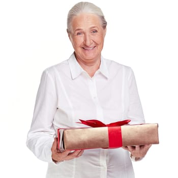 Portrait of elderly female with giftbox looking at camera