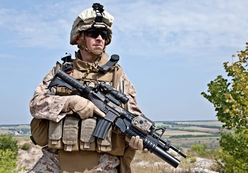 Close-up photo of US marine with his rifle