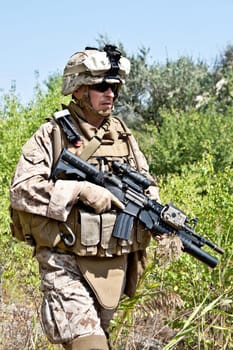 US soldier in the jungle during the military operation