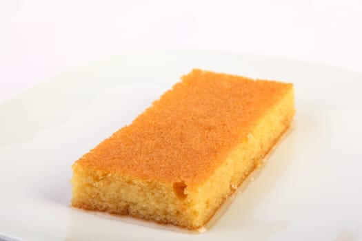 Typical turkish dessert revani on white background