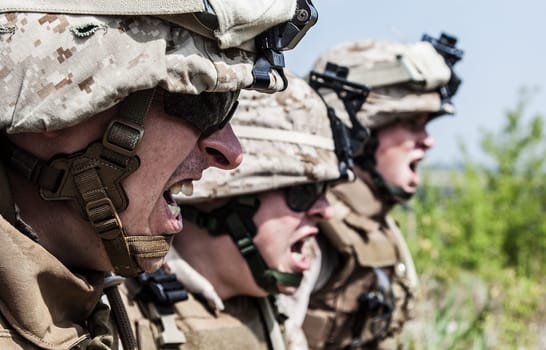 US Marines shouting at somebody showing war face