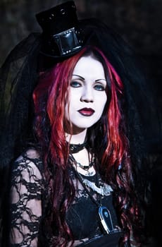 Young goth girl with a red hair