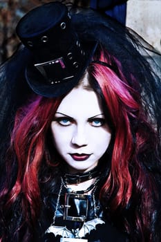 Young goth girl with a red hair