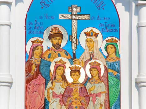 fresco on the temple wall with the image of saint tsar family