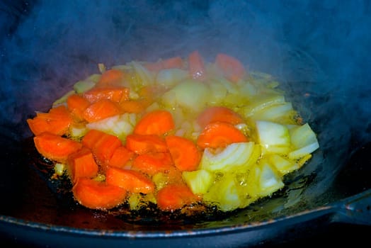 Chinese wok with carrots and onions
