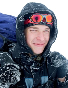 Hiker at the mountains covered with snow
