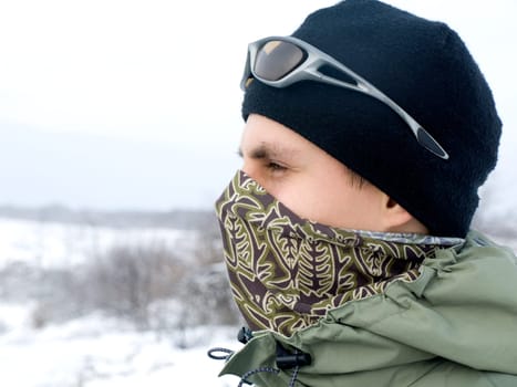 Hiker at the mountains covered with snow