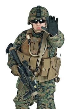 The US Soldier showing arm to prevent shooting