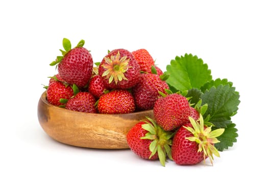 fresh strawberries in a bowl on white background