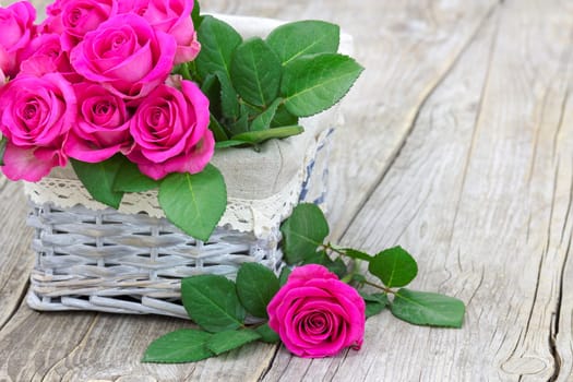 pink roses in a basket