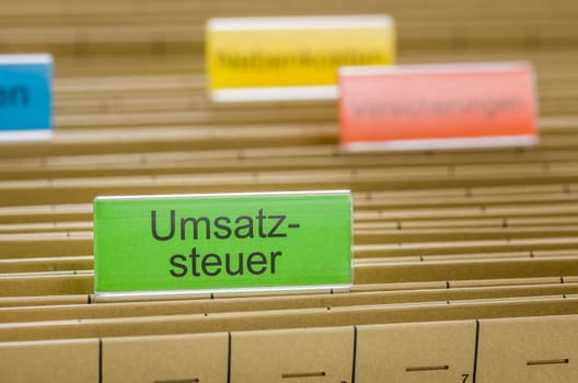 Hanging folders with the inscription VAT