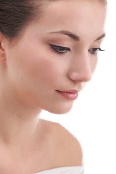 Young womans face with subtle make up and eye lash extensions